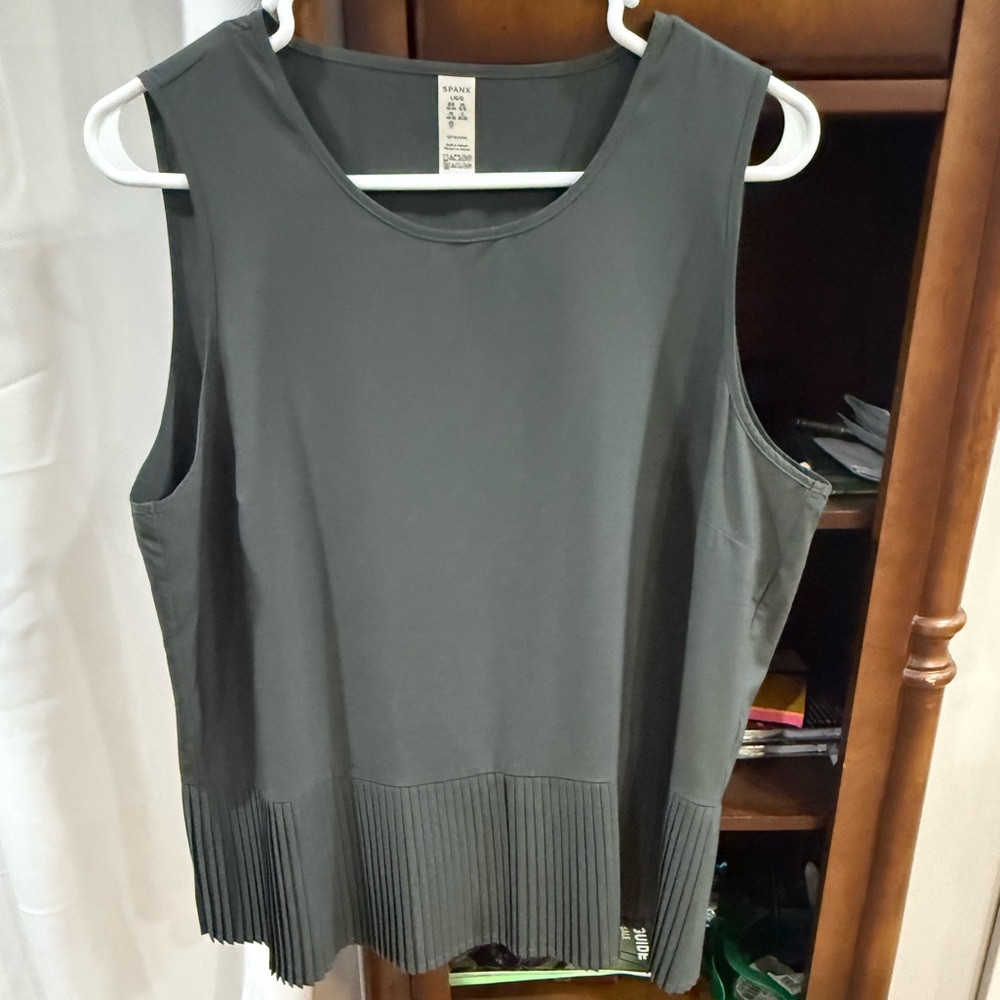Spanx tank top in olive green.Size large. Never worn. In perfect condition